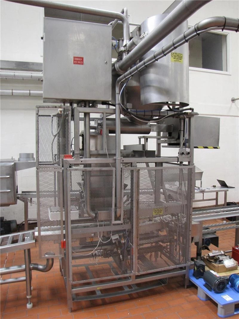 Moldeadora  Dosifiicadora  de queso Chihuaha Cheddar Cotija Con Transporte  de cuajada  seca  desde la tina al moldeador  por ai